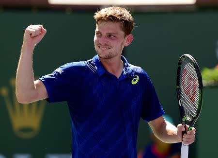 Mar 16, 2016; Indian Wells, CA, USA; David Goffin (BEL) reacts after defeating Stan Wawrinka (SUI) in his 4th round match in the BNP Paribas Open at the Indian Wells Tennis Garden. Goffin won 6-6-3, 5-7, 7-6. Mandatory Credit: Jayne Kamin-Oncea-USA TODAY Sports