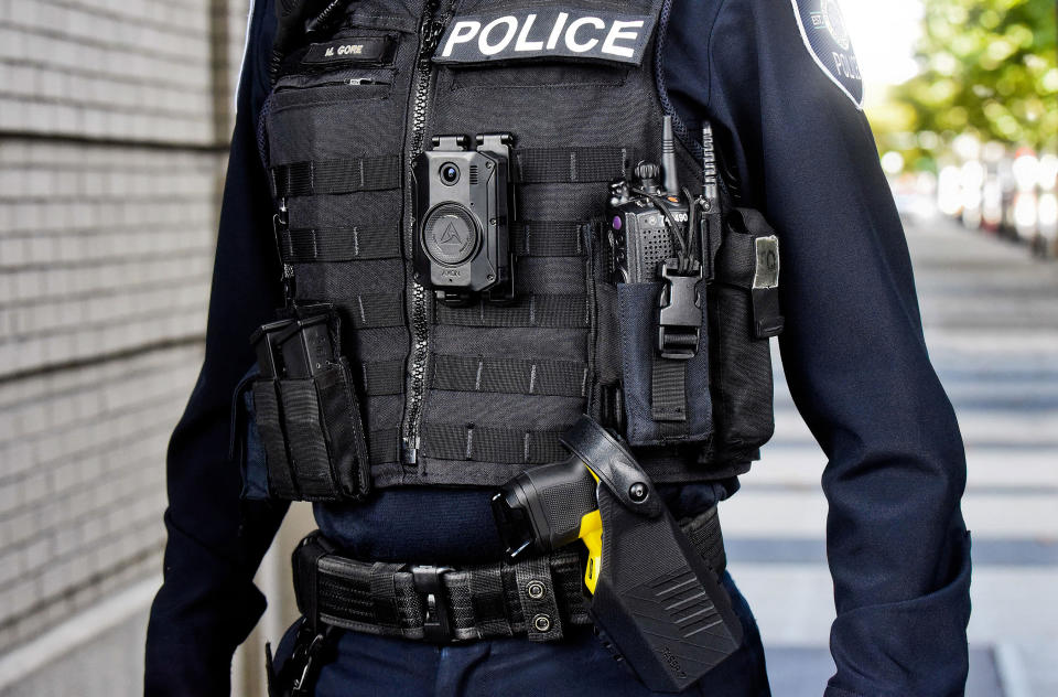 Officer wearing the Axon Body 3 camera.