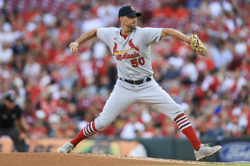 St. Louis Cardinals' Adam Wainwright throws during the first inning of the team's baseball game against the Cincinnati Reds in Cincinnati, Friday, July 22, 2022. (AP Photo/Aaron Doster)