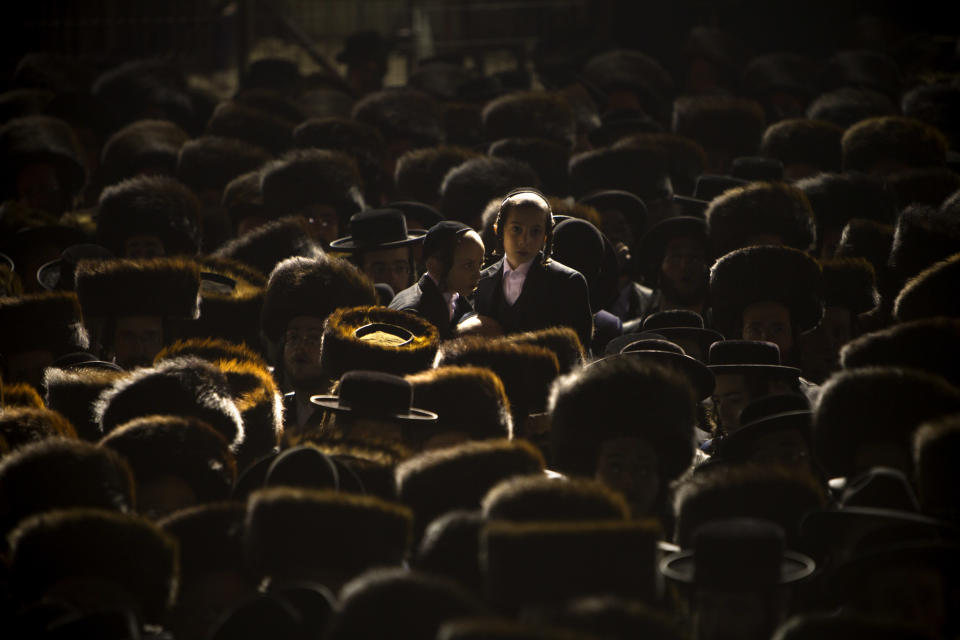 In this Wednesday, Jan. 23, 2013 photo, Ultra-Orthodox Jews gather for traditional Jewish wedding of the granddaughter of Satmar Rebbe of Williamsburg, Rabbi Zalman Leib Teitelbaum, in the Israeli town of Beit Shemesh, near Jerusalem, Israel. (AP Photo/Oded Balilty)