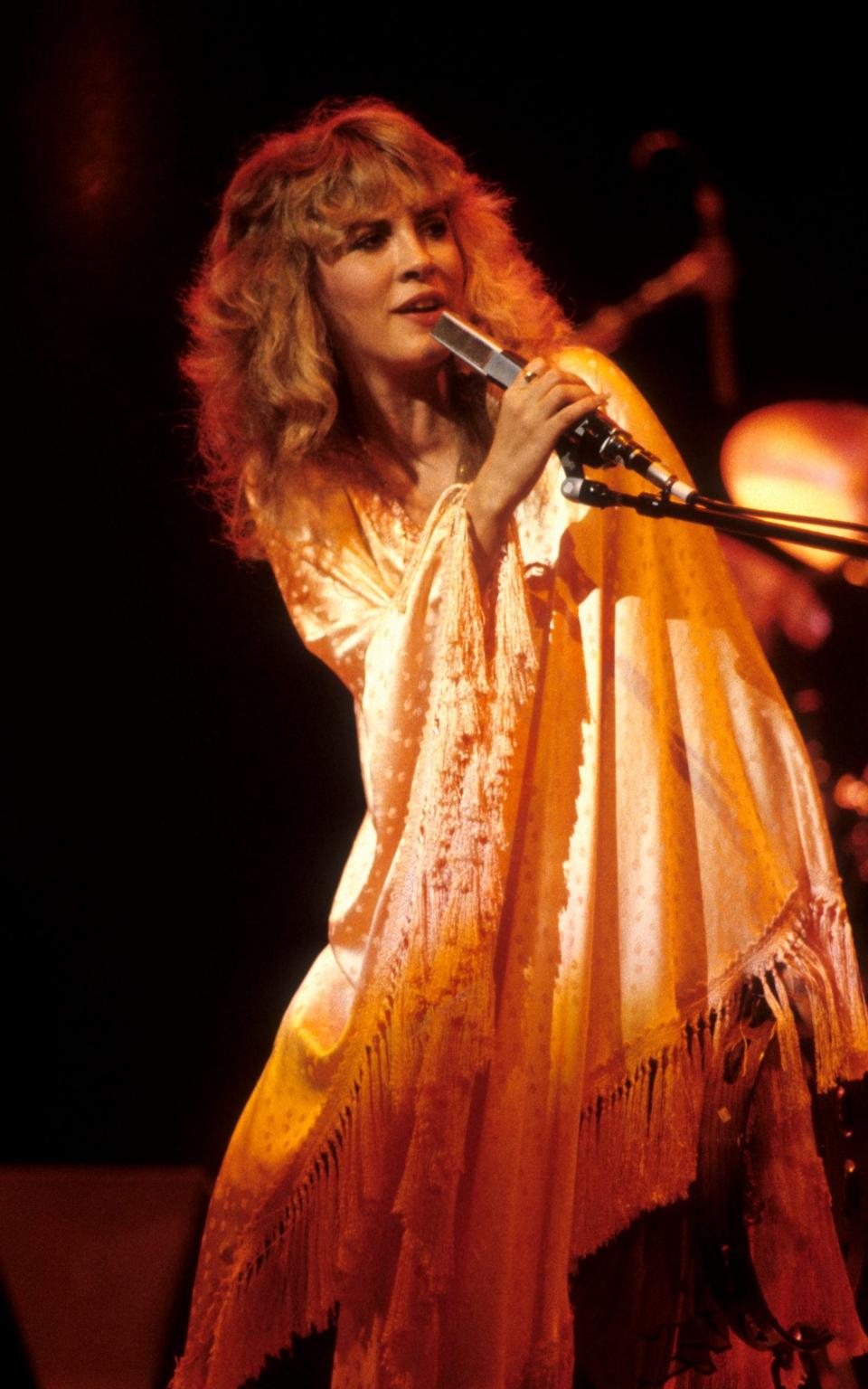  Stevie Nicks performing at the Oakland Coliseum in Oakland, California on her first solo tour on December 3. 1981. - Getty