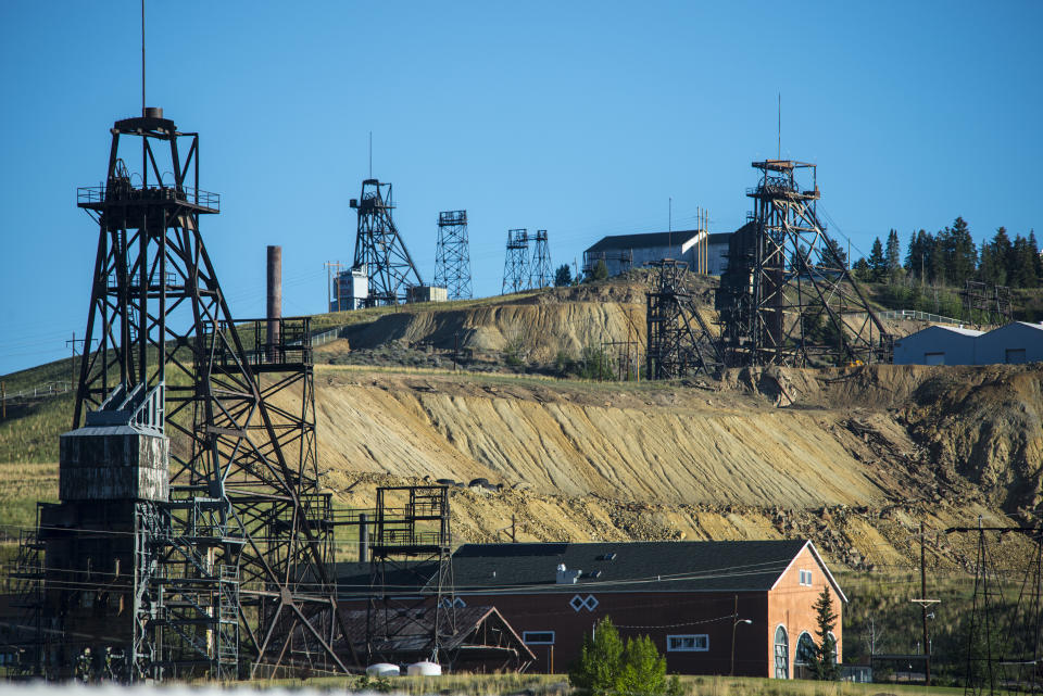 Old copper mine shaft headframes on a hill above Butte, Montana. (Photo: William Campbell via Getty Images)