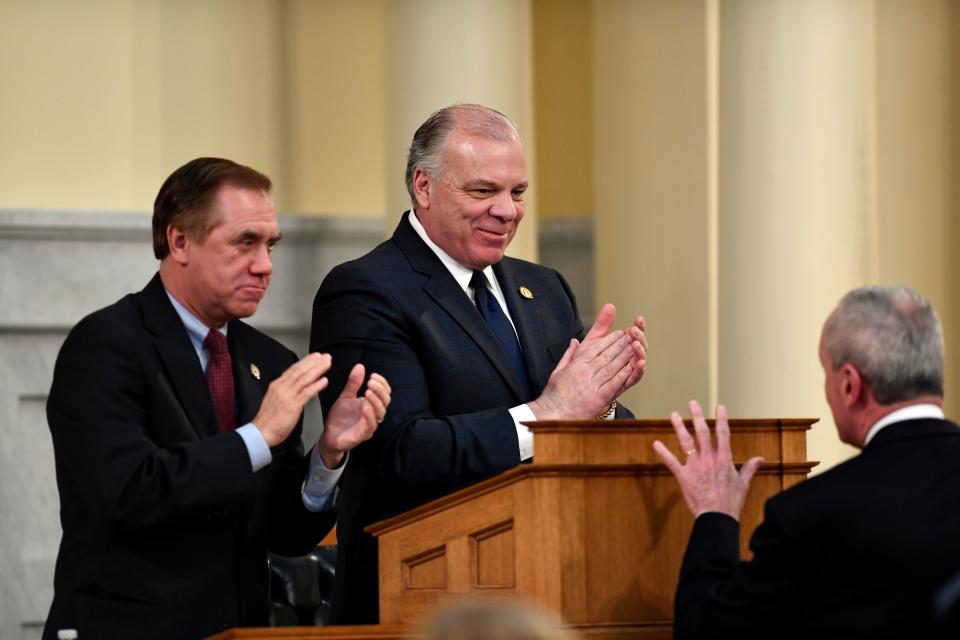 (from left) New Jersey Assembly Speaker Craig Coughlin and Senate President Steve Sweeney applaud Governor Phil Murphy during his state budget speech on Tuesday, March 5, 2019, in Trenton. 