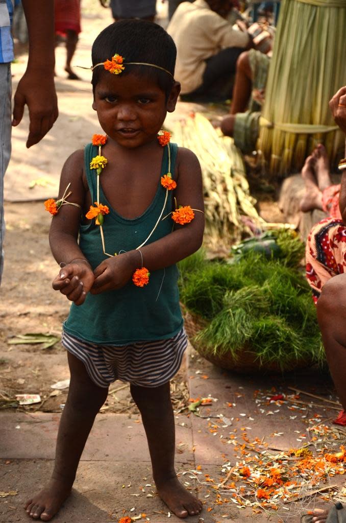 A child at the flower market in Howrah.