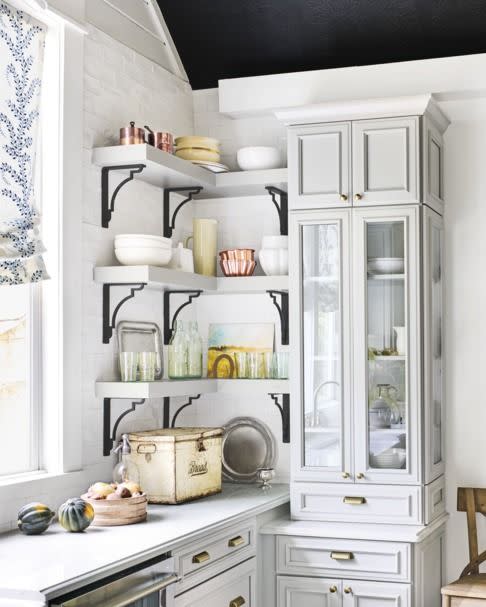 Bold Hardware in a White Kitchen