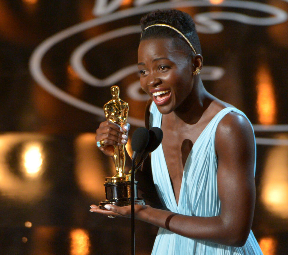 Lupita Nyong'o accepts the award for best actress in a supporting role for "12 Years a Slave" during the Oscars at the Dolby Theatre on Sunday, March 2, 2014, in Los Angeles. (Photo by John Shearer/Invision/AP)