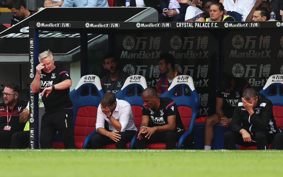 Frank de Boer holds his head in his hands as Crystal Palace fall further behind