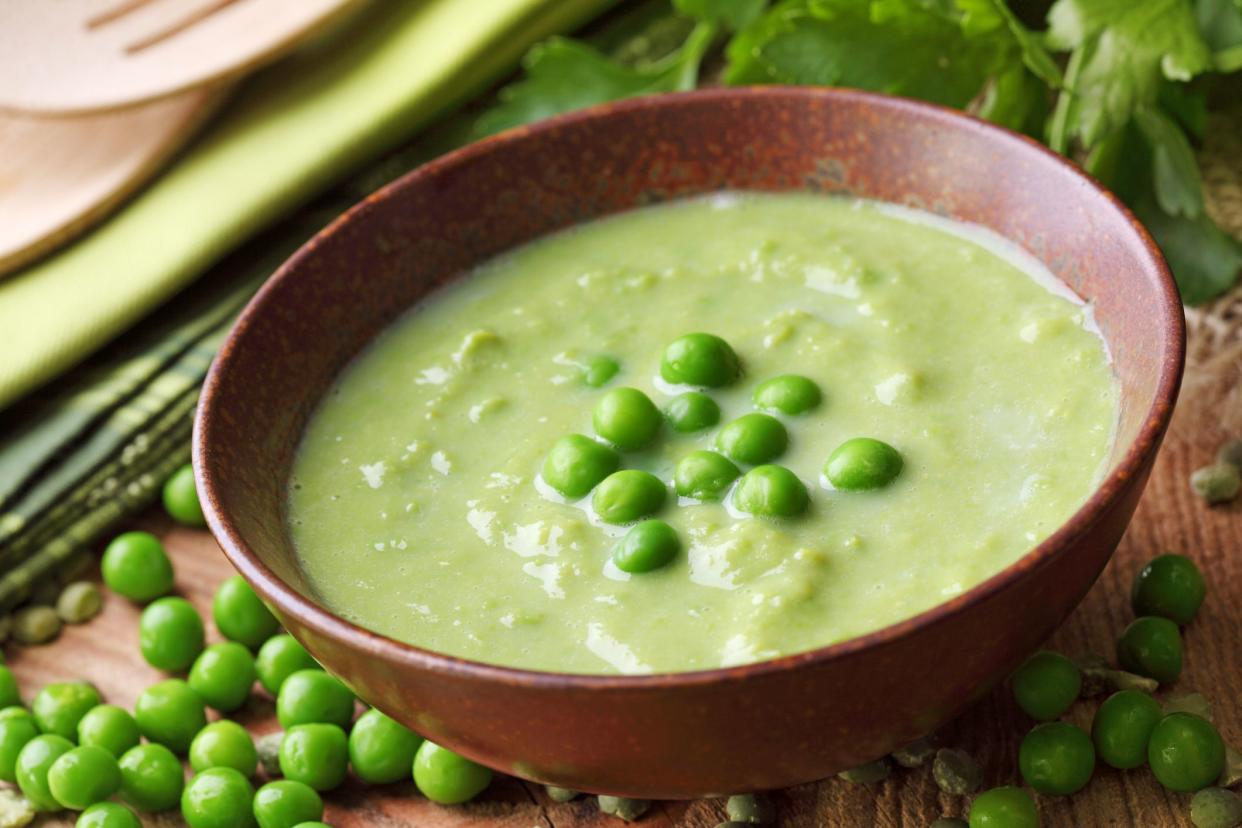 Green pea soup in bowl