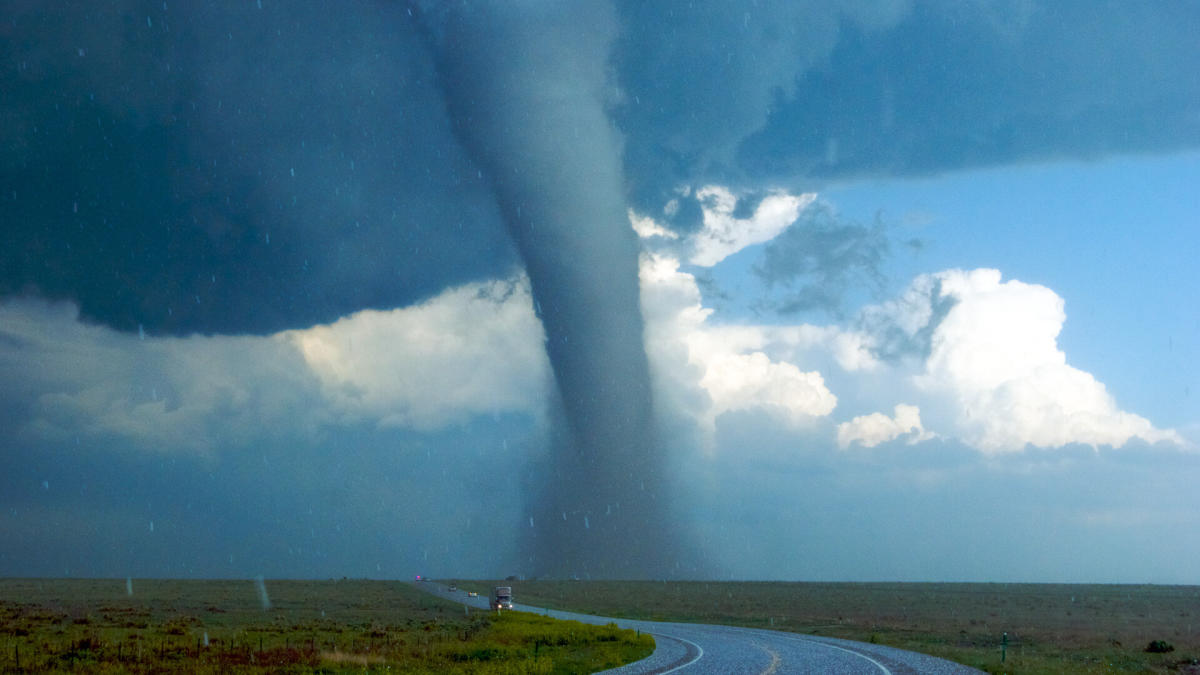 Storm chaser records video inside twister