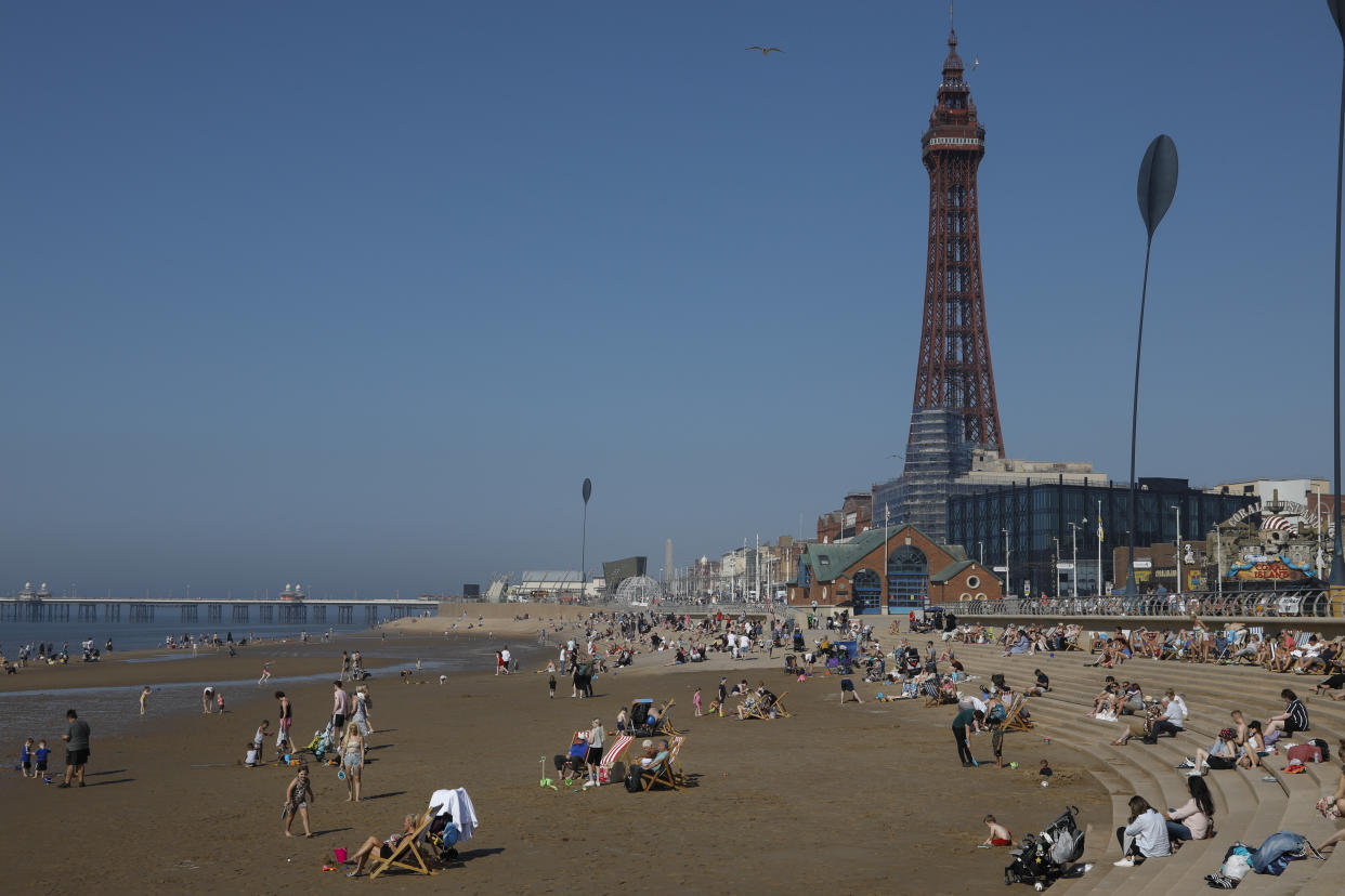 Domestic tourists enjoying the scorching hot weather on the beach, some with deck chairs, with the world famous Blackpool Tower in the background as temperatures in the country are expected to soar this week on 7th September, 2021 in Blackpool, United Kingdom. Temperatures in the UK are predicted to soar to highs of 29 degrees celsius, coinciding with a rise in daycation and staycation domestic tourism in the country as a result of Covid-19 precautions that make foreign travel increasingly costly and difficult. (photo by Daniel Harvey Gonzalez/In Pictures via Getty Images)