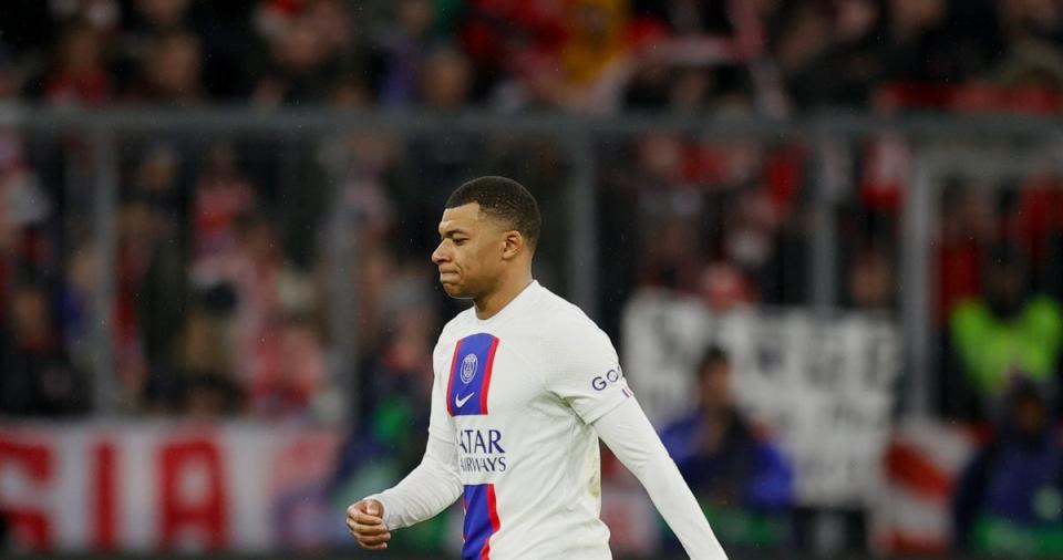 Kylian Mbappe walks off the pitch after defeat by Bayern Munich (EPA)