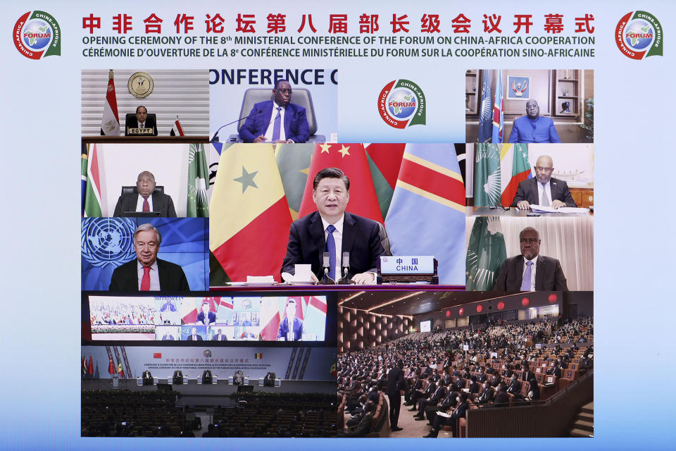In this photo released by Xinhua News Agency, Chinese President Xi Jinping delivers a keynote speech at the opening ceremony of the Eighth Ministerial Conference of the Forum on China-Africa Cooperation (FOCAC) via video link in Beijing on Monday, Nov. 29, 2021. China has pledged to donate 600 million doses of its COVID vaccines to Africa as the world grapples with the unequal distribution of the shots between rich and poor countries. (Liu Bin/Xinhua via AP)