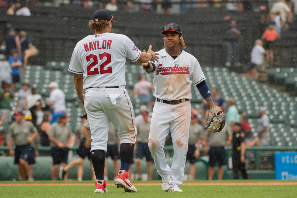 Josh Naylor greets Jose Ramirez after the Guardians completed their sweep Wednesday of the Kansas City Royals in Cleveland.