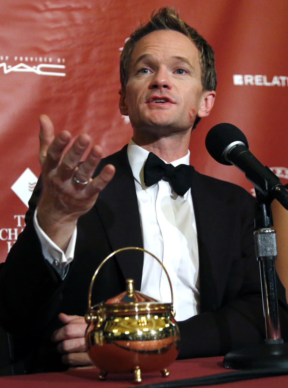 Actor Neil Patrick Harris speaks during a news conference after his roast as Man of The Year by Harvard University's Hasty Pudding Theatricals in Cambridge, Mass., Friday, Feb. 7, 2014. (AP Photo/Elise Amendola)