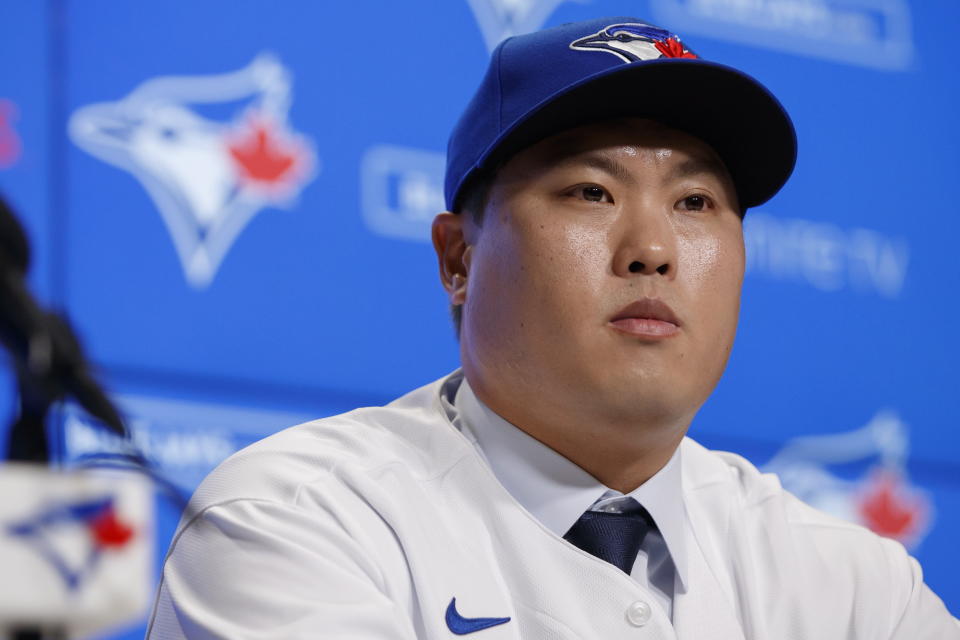 Toronto Blue Jays newly signed pitcher Hyun-Jin Ryu attends a news conference announcing his signing to the team in Toronto, Friday, Dec. 27, 2019. (Cole Burston/The Canadian Press via AP)