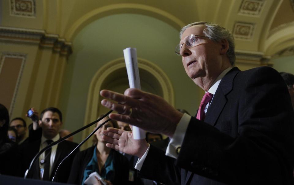 Senate Minority Leader Mitch McConnell of Ky. speaks during a news conference on Capitol Hill in Washington, Tuesday, Jan. 14, 2014, following a Republican policy lunch. A massive $1.1 trillion spending bill, aimed at funding the government through October and putting to rest the bitter budget battles of last year, is getting generally positive reviews from House Republicans who are eager to avoid another shutdown crisis with elections looming. (AP Photo/Susan Walsh)