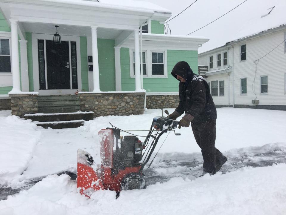 George Tower clears off sidewalks on Winthrop Street in Taunton on Friday morning, Jan. 7, 2022.