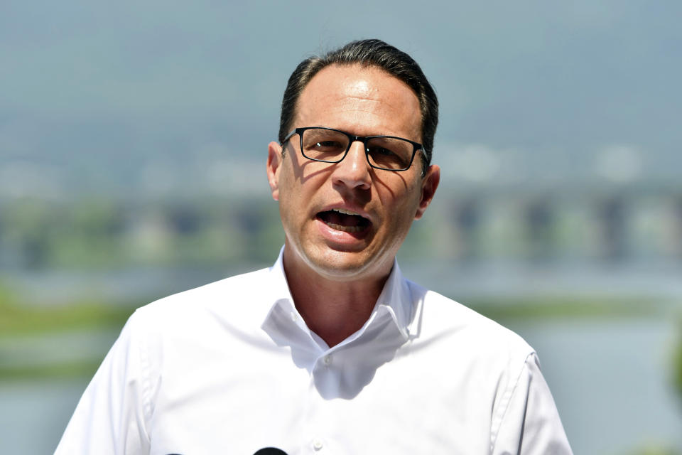 Pennsylvania Gov. Josh Shapiro speaks during a news conference overlooking the Susquehanna River from a balcony at the offices of the Susquehanna River Basin Commission, Tuesday, July 9, 2024, in Harrisburg, Pa. (AP Photo/Marc Levy)