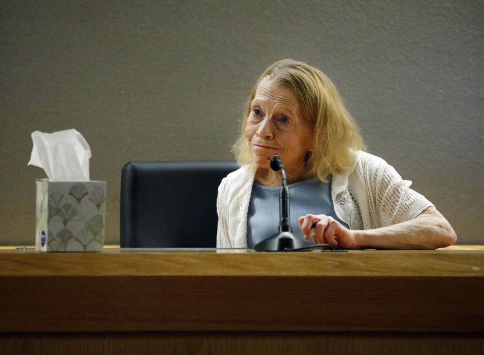 Karen Guyger speaks about her daughter former Dallas police Officer Amber Guyger on the witness stand as she is questioned by defense attorney Shelley Shook during the sentencing phase of Amber Guyger's trial, at the Frank Crowley Courts Building in Dallas, Wednesday, Oct. 2, 2019. Guyger was convicted of murder Tuesday in the killing of Botham Jean and faces a sentence that could range from five years to life in prison or be lowered to as little as two years if the jury decides the shooting was a crime of sudden passion. (Tom Fox/The Dallas Morning News via AP, Pool)