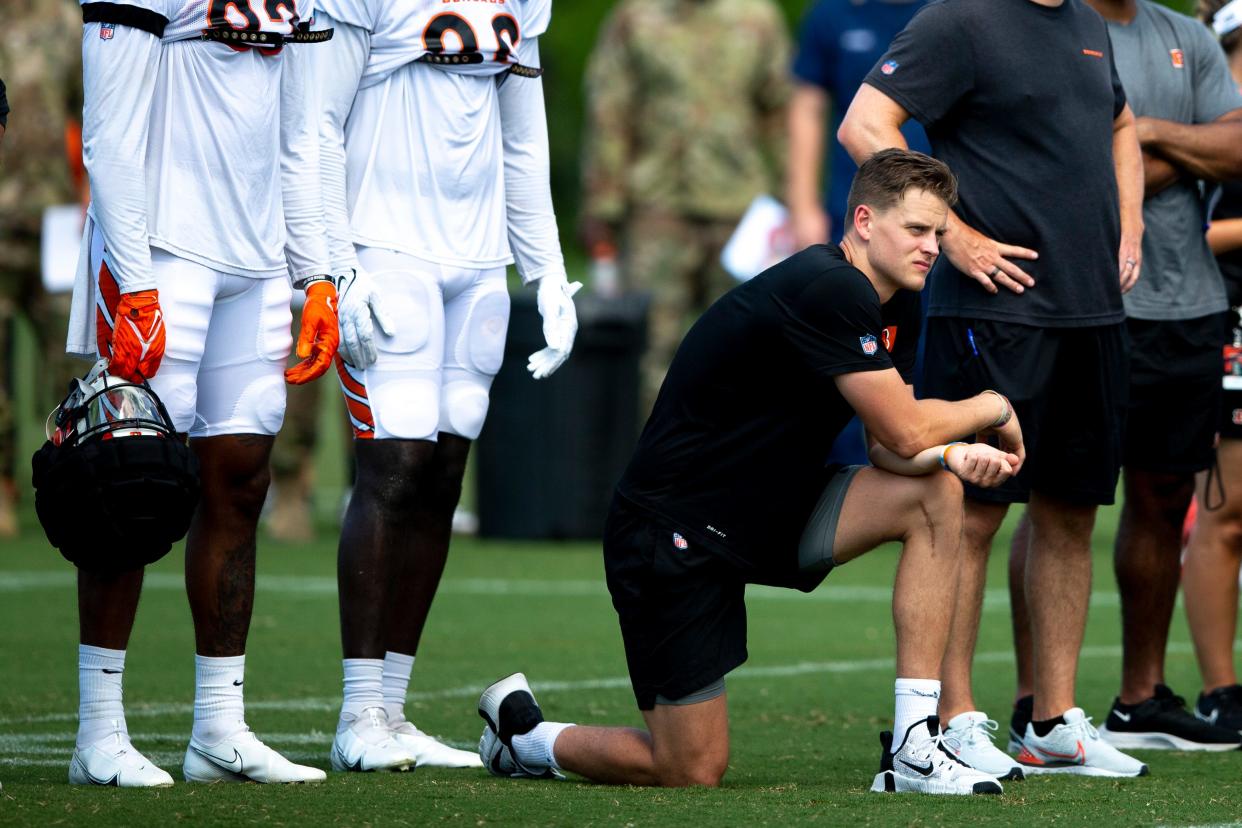 Cincinnati Bengals quarterback Joe Burrow (9) looks on  during Cincinnati Bengals preseason training camp at Paul Brown Stadium training facility in Cincinnati on Monday, Aug. 8, 2022.