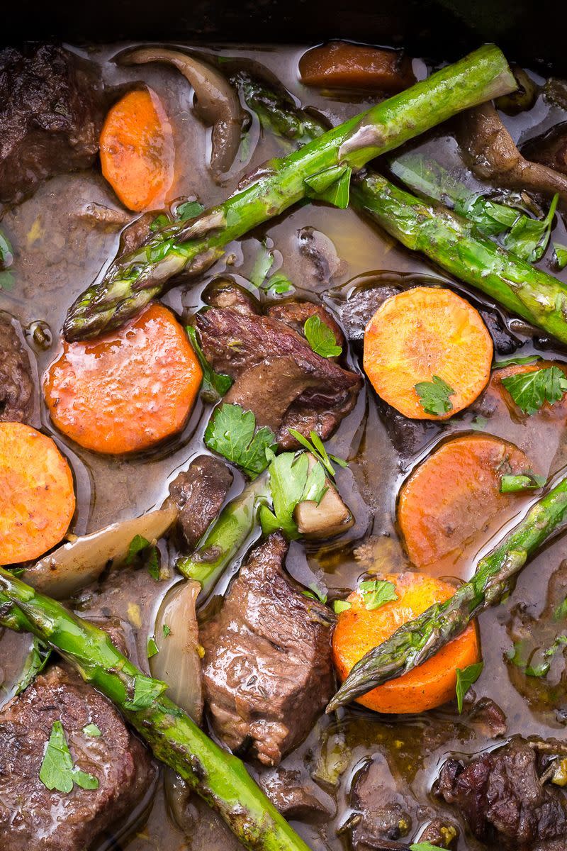 <p>Add some freshness to the beefy classic with this insanely delish slow cooker dinner.</p><p>Get the <a href="https://www.delish.com/uk/cooking/recipes/a28830287/slow-cooker-beef-bourguignon/" rel="nofollow noopener" target="_blank" data-ylk="slk:Slow Cooker Spring Beef Bourguignon;elm:context_link;itc:0;sec:content-canvas" class="link ">Slow Cooker Spring Beef Bourguignon</a> recipe.</p>