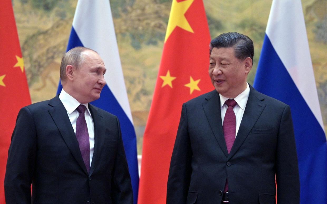 The report did not make clear if it was Putin and Xi Jinping who discussed the matter - GETTY IMAGES