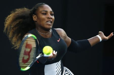 Tennis - Australian Open - Melbourne Park, Melbourne, Australia - 28/1/17 Serena Williams of the U.S. hits a shot during her Women's singles final match against Venus Williams of the U.S. .REUTERS/Thomas Peter