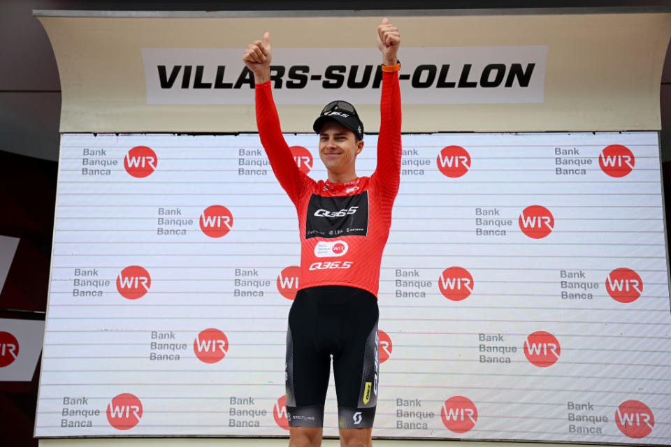 VILLARSSUROLLON SWITZERLAND  JUNE 13 Nickolas Zukowsky of Canada and Q365 Pro Cycling Team celebrates at podium as Red Mountain Jersey winner during the 86th Tour de Suisse 2023 Stage 3 a 1438km stage from Tafers to VillarssurOllon 1256m  UCIWT  on June 13 2023 in VillarssurOllon Switzerland Photo by Dario BelingheriGetty Images