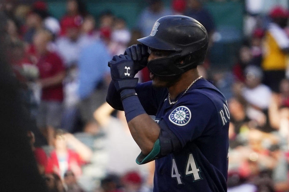 Seattle Mariners' Julio Rodriguez gestures as he rounds second after hitting a solo home run during the first inning of a baseball game against the Los Angeles Angels Saturday, June 25, 2022, in Anaheim, Calif. (AP Photo/Mark J. Terrill)