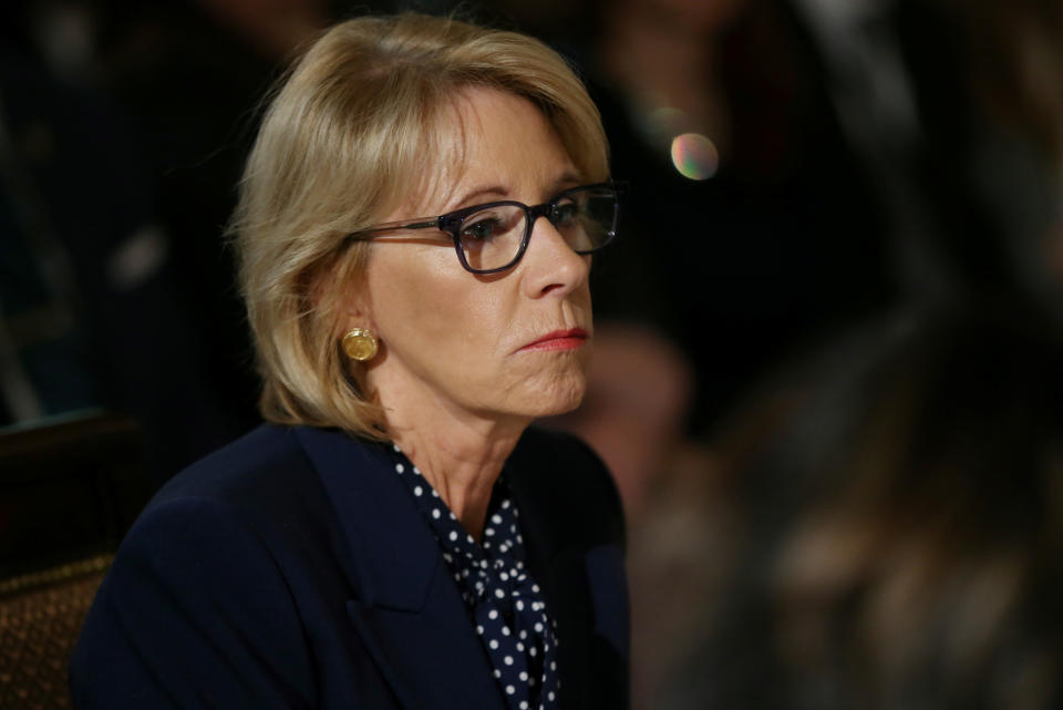 U.S. Education Secretary Betsy DeVos participates in an interagency working group to discuss youth programs hosted by U.S. first lady Melania Trump that line up with Melania Trump's Be Best campaign in the State Dining Room at the White House in Washington, U.S., March 18, 2019. REUTERS/Leah Millis