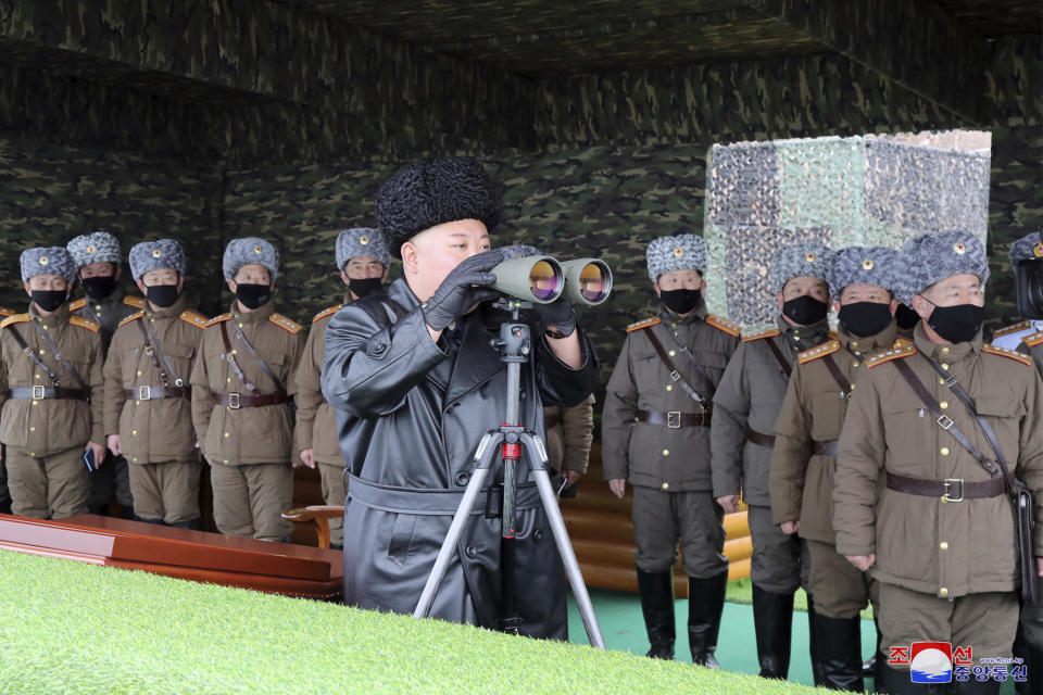 FILE - In this Friday, Feb. 28, 2020, file photo provided on Feb. 29, 2020 by the North Korean government, North Korean leader Kim Jong Un, center, inspects the military drill of units of the Korean People's Army, with soldiers shown wearing face masks. Independent journalists were not given access to cover the event depicted in this image distributed by the North Korean government. The content of this image is as provided and cannot be independently verified. Korean language watermark on image as provided by source reads: "KCNA" which is the abbreviation for Korean Central News Agency. (Korean Central News Agency/Korea News Service via AP, File)