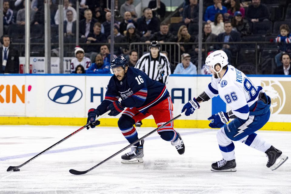 New York Rangers center Vincent Trocheck (16) and Tampa Bay Lightning right wing Nikita Kucherov (86) during the first period of an NHL hockey game on Wednesday, Feb. 7, 2024 in New York. (AP Photo/Peter K. Afriyie)