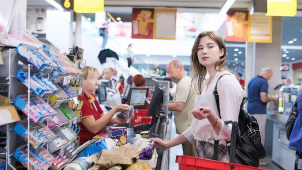 PHOTO: A shopper stands at the checkout lane while purchasing groceries at a supermarket, in a stock photo. (Bodnar/Shutterstock, FILE )