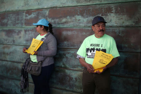 People protest outside a Snap Inc. office in Venice, a beach community of Los Angeles, California, U.S., March 2, 2017. REUTERS/Lucy Nicholson