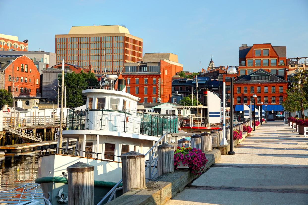 Portland, ME town center with canal and boats in summer