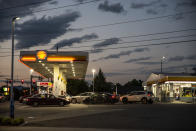 Drivers line up for fuel at a Shell Gas Station on Old Forest Road in Lynchburg, Va., Tuesday, May 11, 2021. More than 1,000 gas stations in the Southeast reported running out of fuel, primarily because of what analysts say is unwarranted panic-buying among drivers, as the shutdown of a major pipeline by hackers entered its fifth day. In response, Virginia Gov. Ralph Northam declared a state of emergency. (Kendall Warner/The News & Advance via AP)