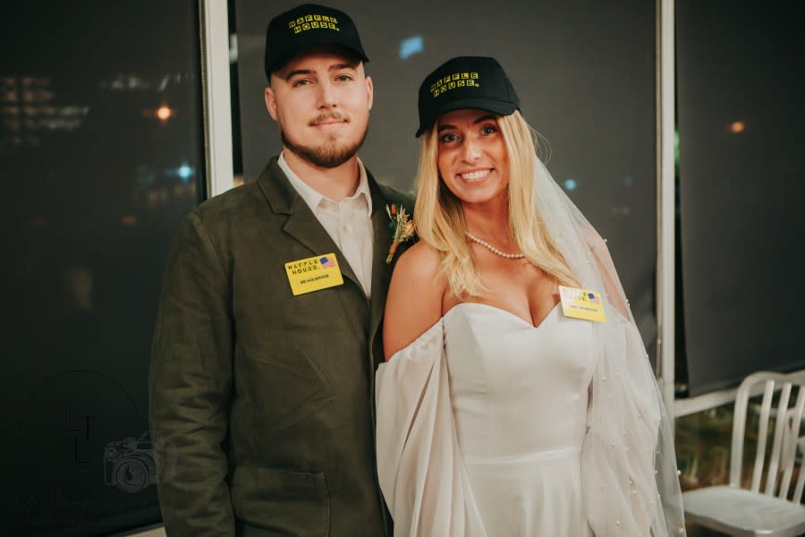 <em>Newlyweds Mary Cate and Eli Holbrook hold their wedding reception at a Waffle House in Lebanon, Tennessee. (Photo credit: Jessica Hamblen with Life Through a Lens provided to NewsNation.)</em>