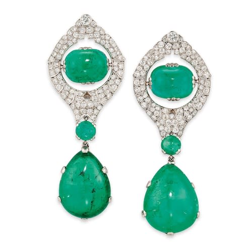 Cabochon circular, cushion and pear shaped emerald drops of 38.59 and 28.27 carats - Credit: Jon Stokes