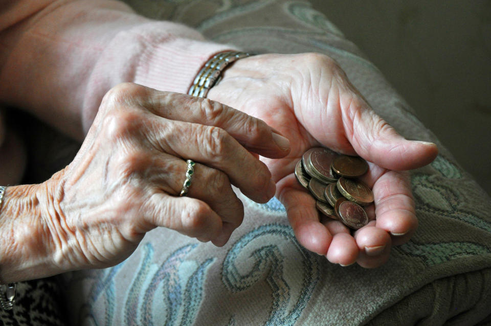 EMBARGOED TO 0001 MONDAY SEPTEMBER 20 Undated handout photo of an elderly woman counting loose change. About one in five female pensioners is living in poverty, according to Age UK. Analysis by the charity found around 1.25 million women in this group are now living below the breadline. Issue date: Monday September 20, 2021.