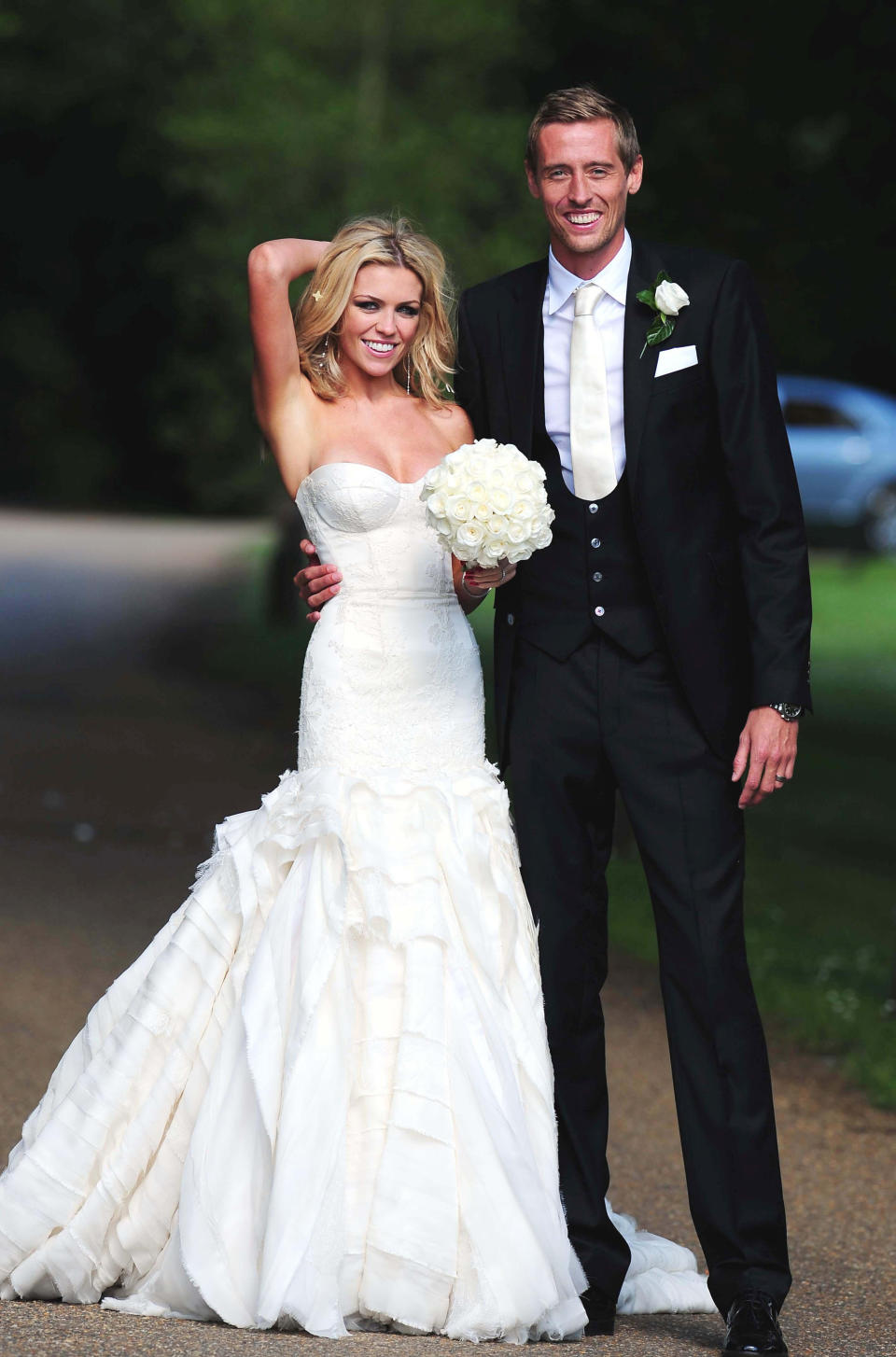 Footballer Peter Crouch and model Abbey Clancy in the grounds of Stapleford Park in Leicester following their wedding.