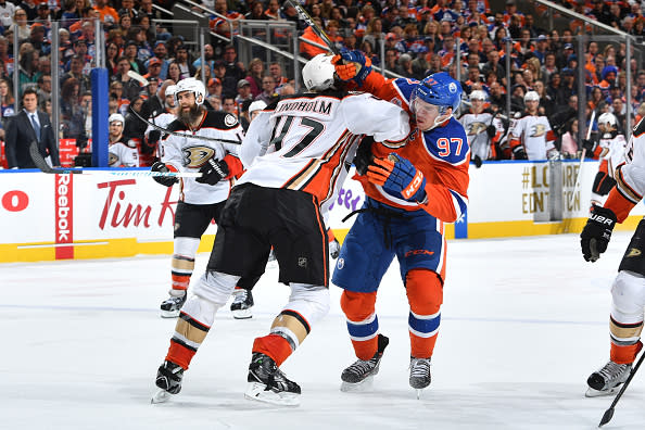 EDMONTON, AB - APRIL 1: Connor McDavid #97 of the Edmonton Oilers battles for the puck against Hampus Lindholm #47 of the Anaheim Ducks on April 1, 2017 at Rogers Place in Edmonton, Alberta, Canada. (Photo by Andy Devlin/NHLI via Getty Images)