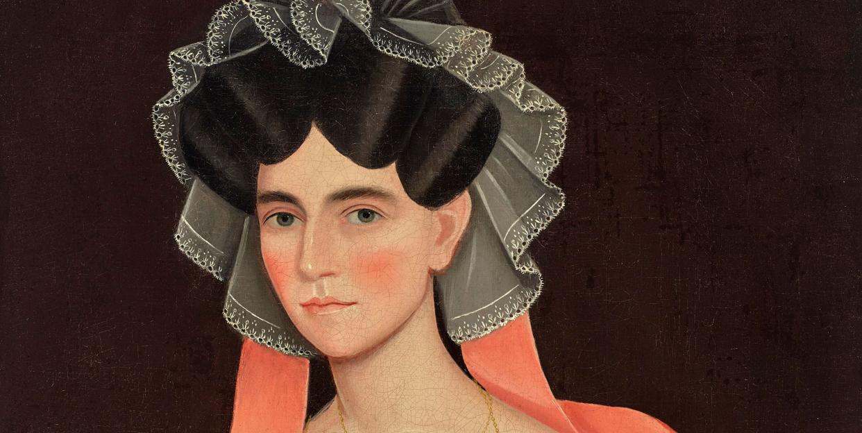 folk portrait of woman with pink ribbons in hair