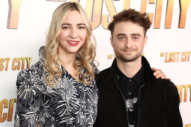 <p>Arturo Holmes/WireImage</p> Erin Darke and Daniel Radcliffe in New York City on March 14, 2022