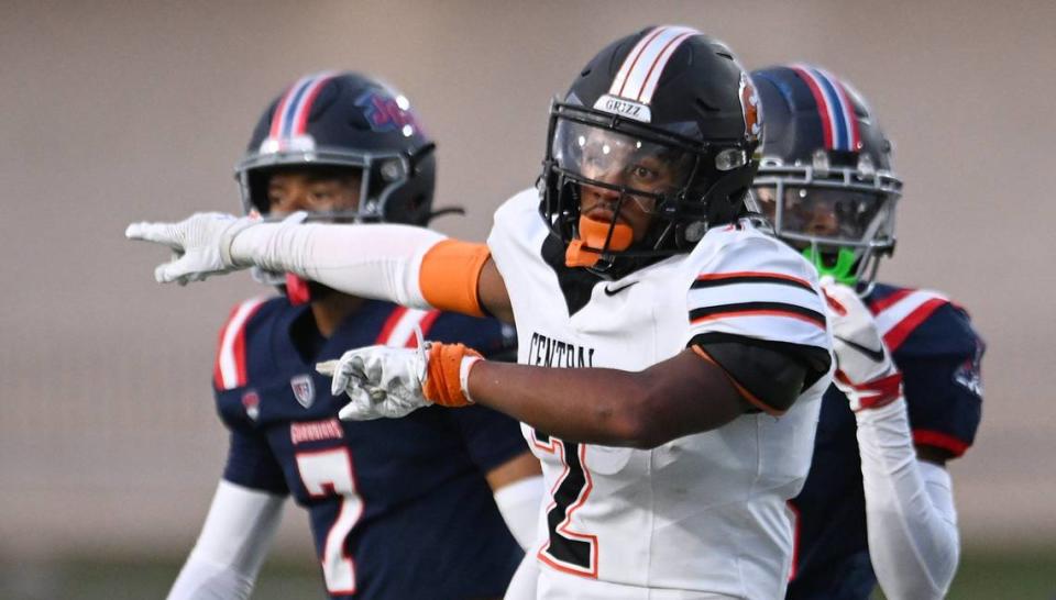 Central High’s Brandon Smith signals a first down for his carry against Garza High in the opening game of the 2024 season at Koligian Stadium Friday, Aug. 23, 2024 in Fresno.