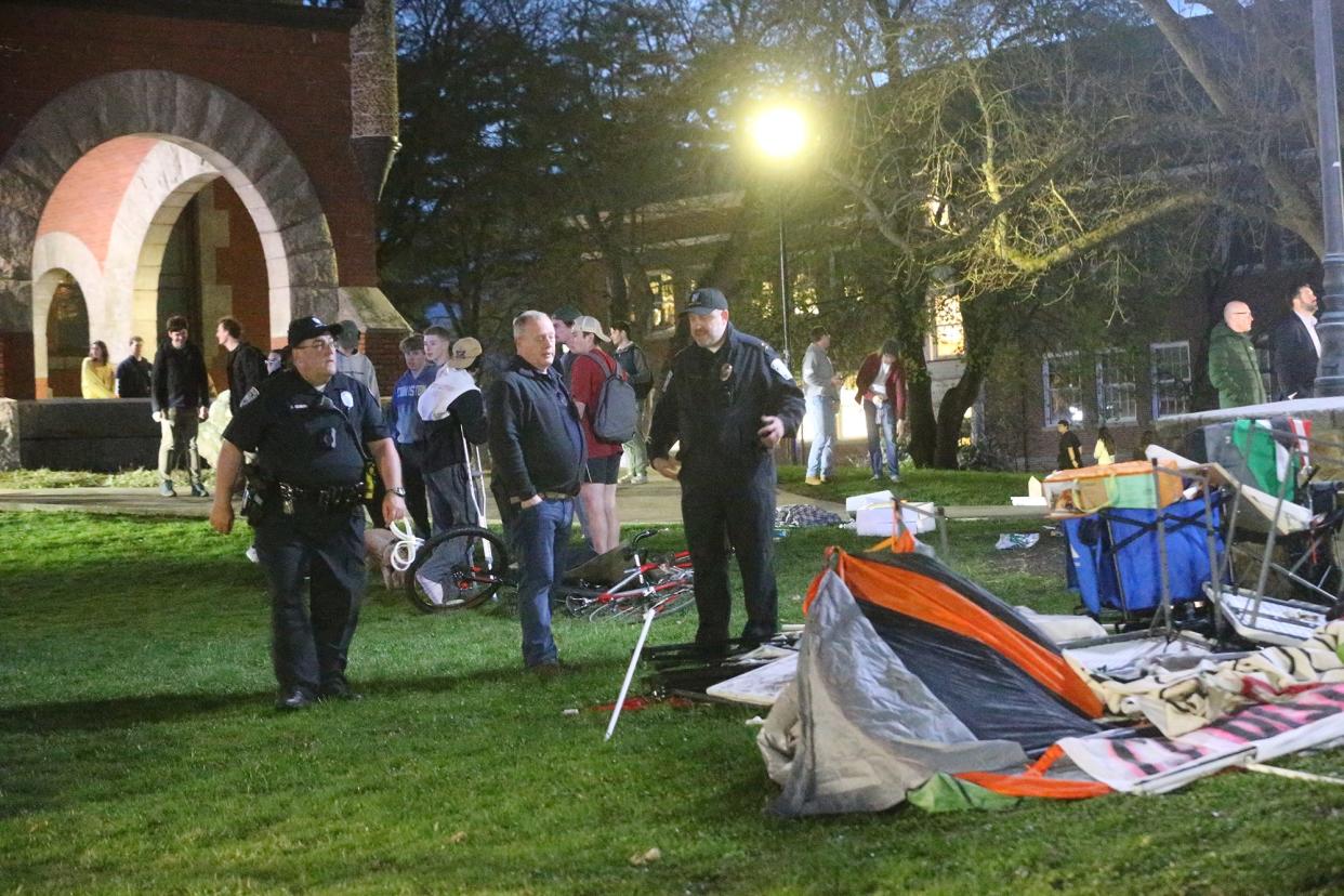 Police took action to remove and arrest pro-Palestinian protesters who started setting up an encampment in front of the University of New Hampshire's Thompson Hall Tuesday night May 1, 2024.