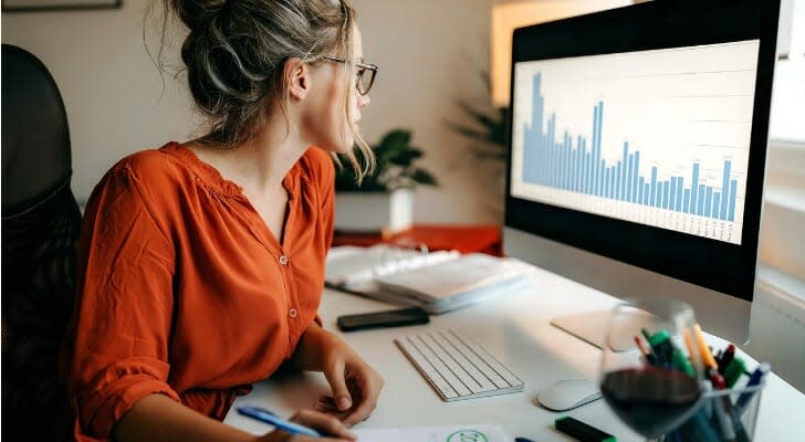 A woman evaluates her stock portfolio on her computer. Value stocks are likely the only asset class to generate a 5%–10% real return over the coming decade, according to Research Affiliates. 