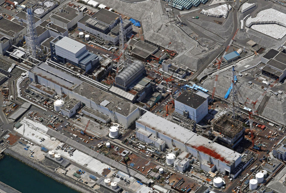 FILE - This April 23, 2019, file photo shows the Fukushima Dai-ichi nuclear power plant in Okuma town, Fukushima prefecture, northeastern Japan, where decommissioning work is underway. A Japanese high court on Wednesday, Sept. 30, 2020 found negligence by the government and the operator of the wrecked Fukushima nuclear plant in failing to take tsunami measures to prevent the 2011 nuclear disaster, ordering them to jointly pay some 1 billion yen ($9.5 million) in damages to thousands of residents for their lost livelihoods. (Suo Takekuma/Kyodo News via AP, File)