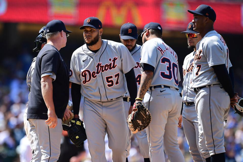 Tigers starting pitcher Eduardo Rodriguez (57) is relieved by manager A.J. Hinch (left) during the sixth inning May 1, 2022 at Dodger Stadium.