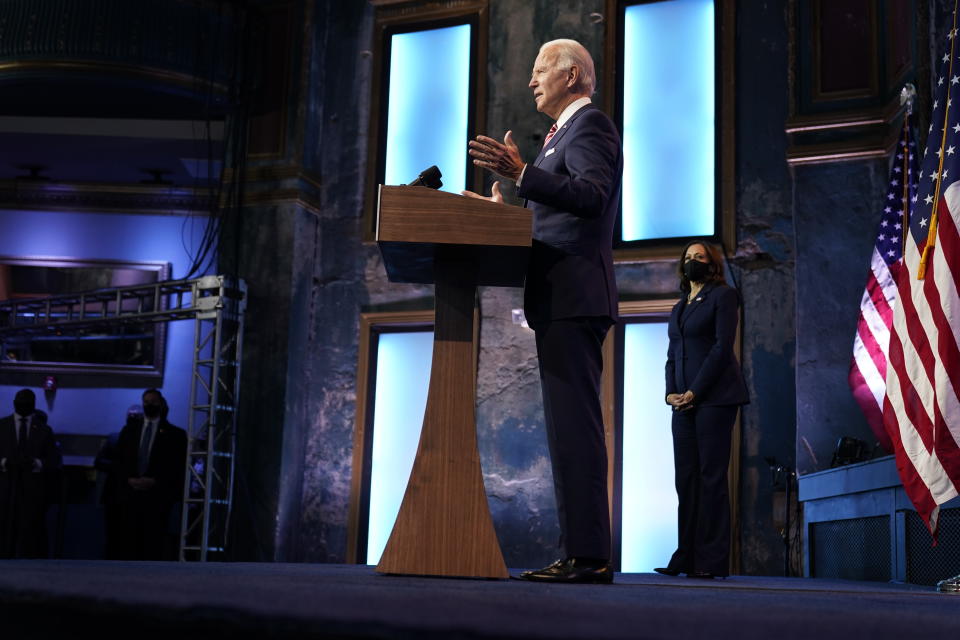 President-elect Joe Biden, accompanied by Vice President-elect Kamala Harris, speaks about economic recovery at The Queen theater, Monday, Nov. 16, 2020, in Wilmington, Del. (AP Photo/Andrew Harnik)