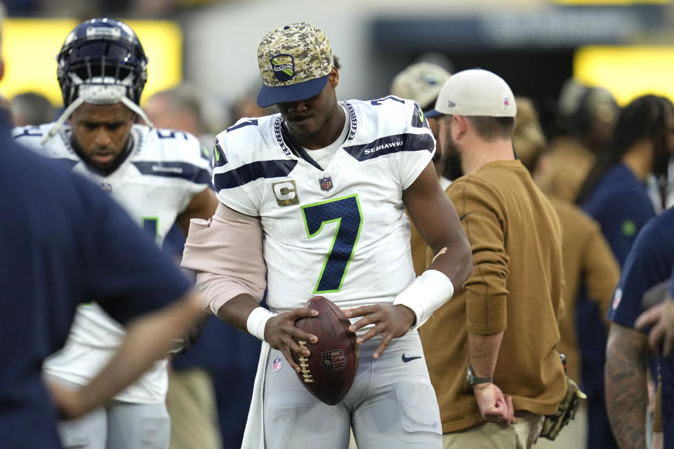 Seattle Seahawks quarterback Geno Smith (7) stands on the sideline after leaving the game due to injury during the second half of an NFL football game against the Los Angeles Rams Sunday, Nov. 19, 2023, in Inglewood, Calif. (AP Photo/Ashley Landis)